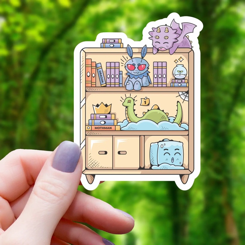 CRYPTIDS AND MONSTERS ON BOOKSHELF STICKER